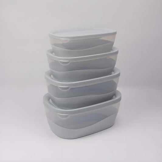 A stack of four nested oval plastic storage containers with translucent gray bodies and solid gray lids, set against a plain light gray background.